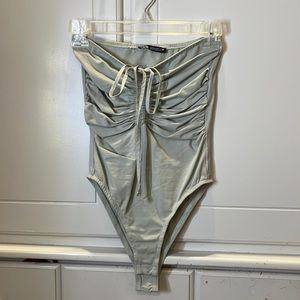 cinched green strapless body suit